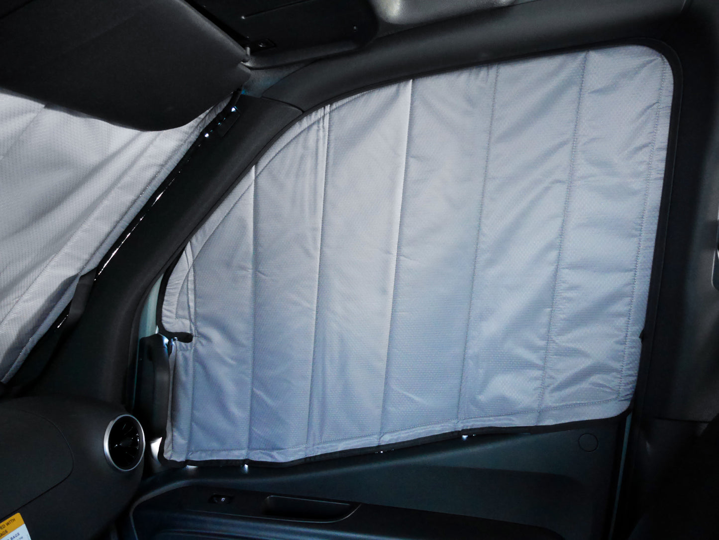 Image of the passenger side cover seamlessly attached to the window with the door closed, showcasing a perfect fit and sleek installation.