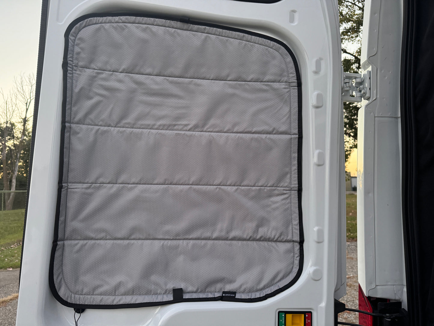 Image of the rear door cover seamlessly attached to the rear door window, showcasing a perfect fit and sleek installation.